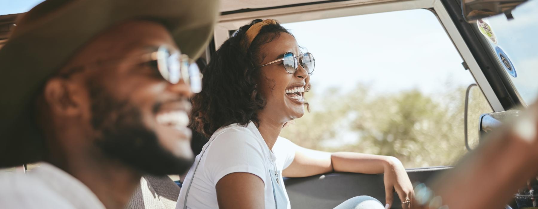 a man and woman in a car